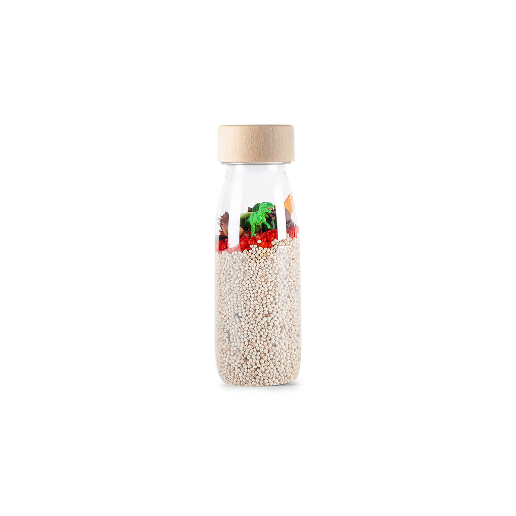 Botella sensorial Petit Boum Spy Dino